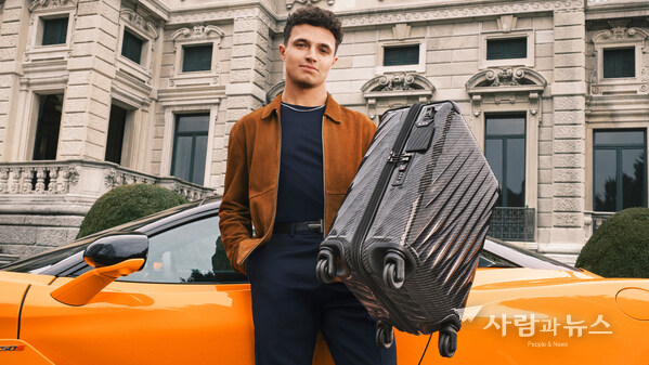 Global Brand Ambassador, Lando Norris, with our 19 Degree Lite International 3 Wheeled Carry-On.
