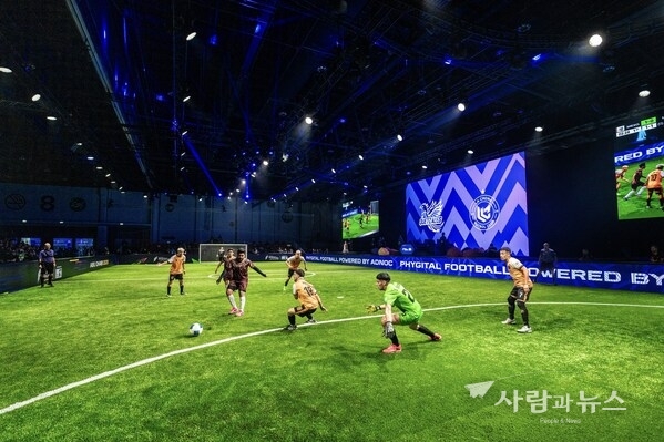 Phygital athletes competing in the physical side of Phygital Football